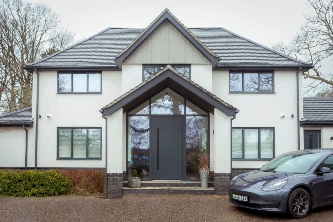 Contemporary Detached Home with Tesla Model 3